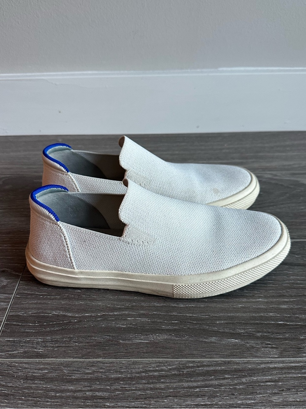 Rothy's Women's Slip-On Flats in White with Blue Trim
